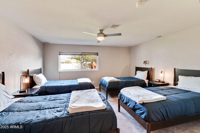 Building Photo - 7074 E Aster Dr