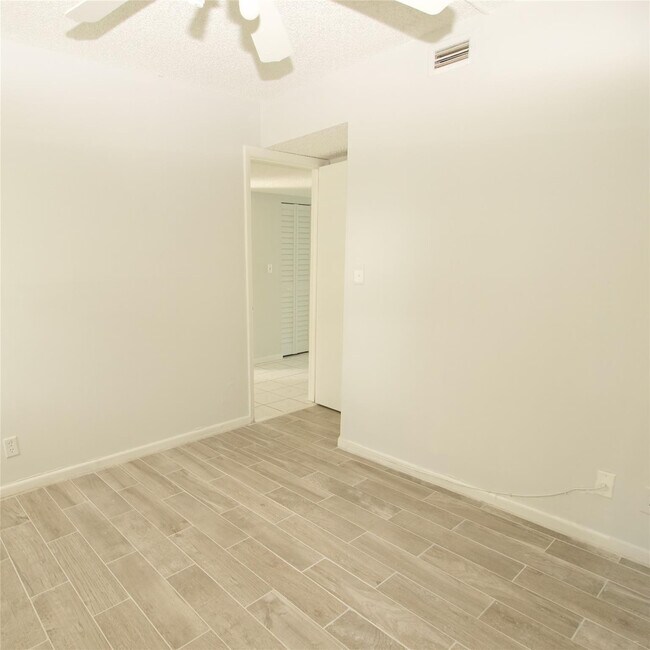 Building Photo - 7355 Woodmont Terrace