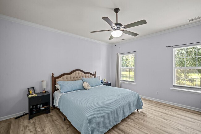 Building Photo - Relax by the Water – 4BR Home with Pond Views in Creekside