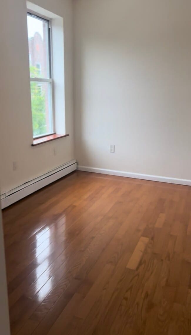 Building Photo - 12307 Jamaica Ave