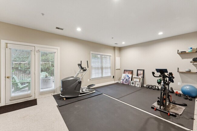 Building Photo - Discover this stunning four-level townhous...