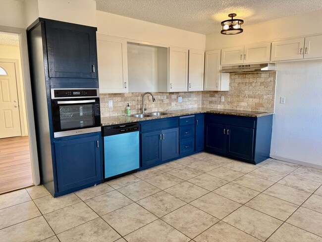 Building Photo - Fully Remodeled 4 Bedroom / 3 Bath Home with Two Primary Suites!