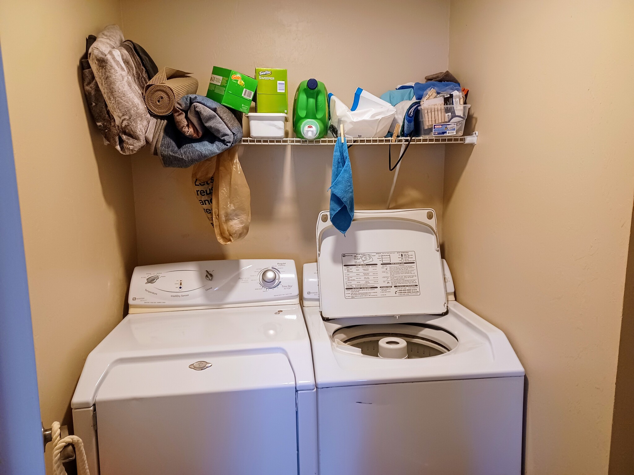Laundry room with washer and dryer in the home. - 12080 Moss Dr
