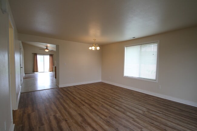 Entering front living area via the front door. There is a coat closet in the entryway. - 9624 Spencer Ct