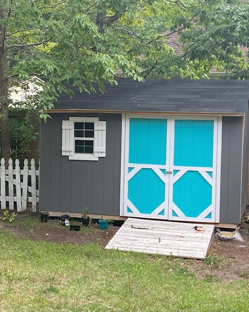 Backyard shed (door color matches the home's front door) - 1977 Culpepper Ln