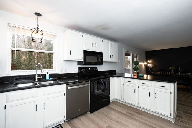 Building Photo - Four bedroom Corner Lot!