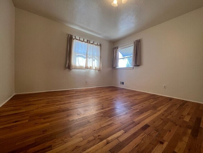 Building Photo - Bi-Level House w/ Massive Backyard, Storage, & Character!