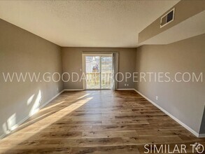 Building Photo - 2 bedroom 1 full bath ground level condo w...