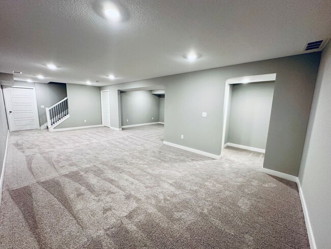 Building Photo - {13305} Less Than 2 Year Old 1.5 Story in ...