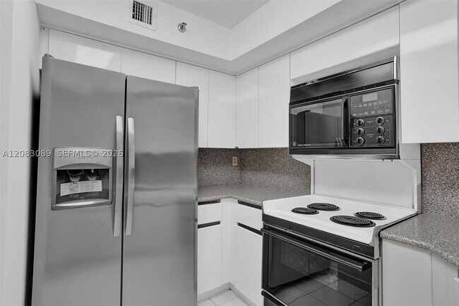 Building Photo - 6767 Collins Ave