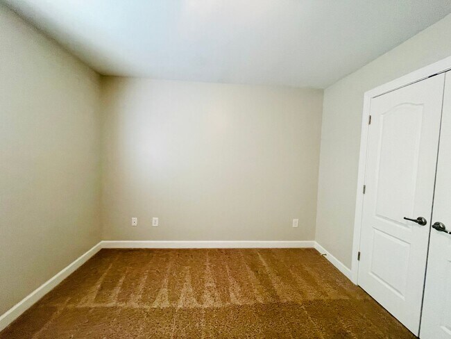 Building Photo - BRAND NEW FLOORING & FRESH PAINT - 3 Bedroom/2.5 Bath Townhome with garage in Wild Wing!