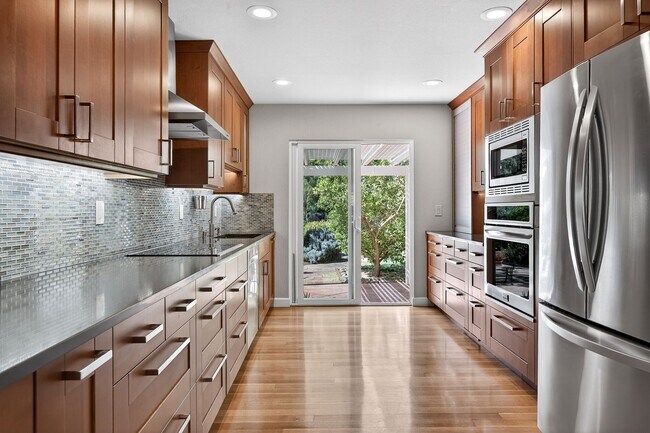 Building Photo - 2,003 Sq Ft Modern 4BR/2BA: Solar, EV Charging & Private Orchard!