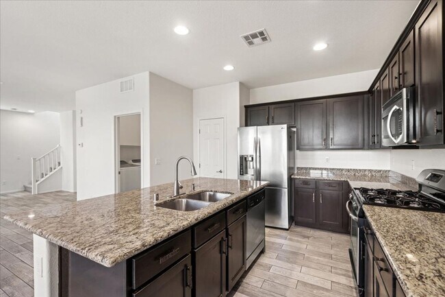 Building Photo - Modern 3 Bedroom Retreat with Designer Finishes & Entertainer’s Backyard