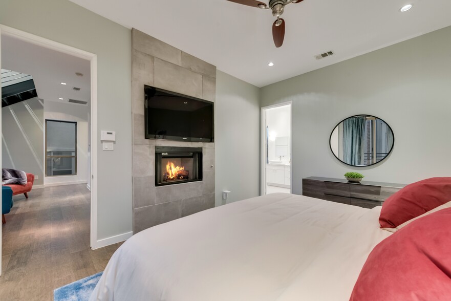 Enjoy the fireplace and Smart TV in your bedroom. - 4434 Holland Ave