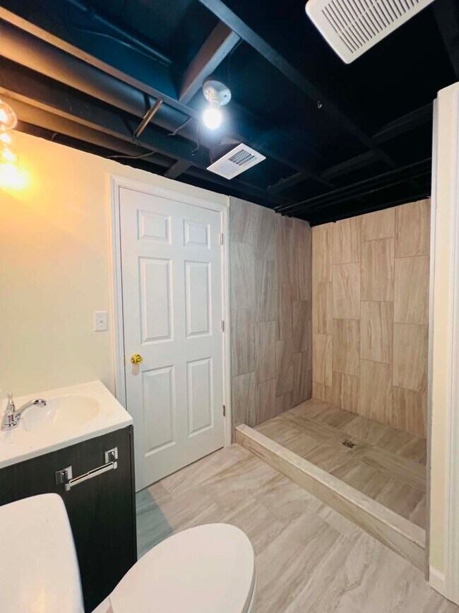 Building Photo - Spacious 4-Bedroom Home with Finished Basement & Attached Garage