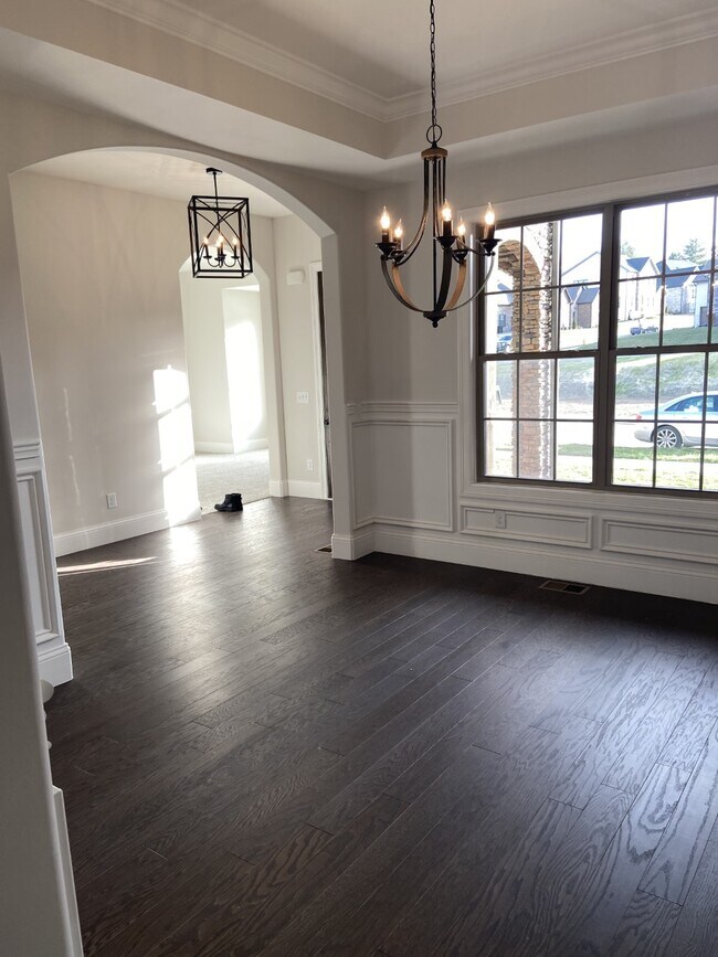 formal dining room across from front office - 1026 October Park Way