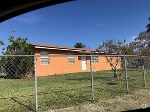 Building Photo - 696 SW 16th Terrace