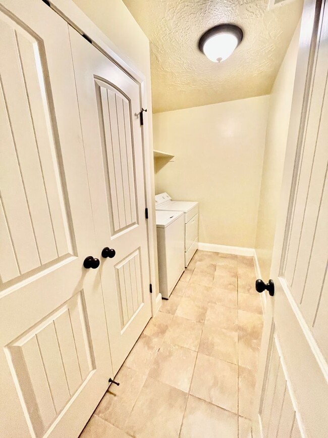 Building Photo - Pet-Friendly Three-Bedroom Townhome with G...