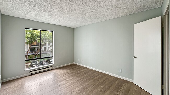 Building Photo - Exceptionally Renovated Corner Apartment at Watergate!
