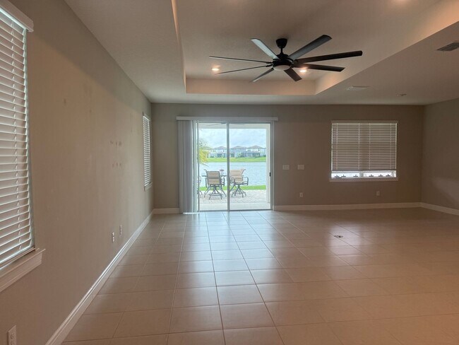 Building Photo - Lakeview Living with Bonus Flex Space & Resort-Style Amenities