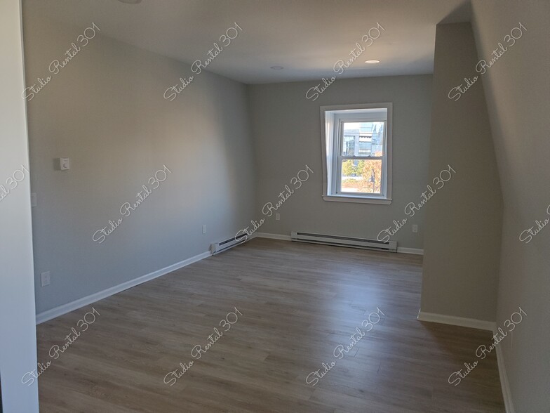 Main Area Unstaged - 9 Pulaski St