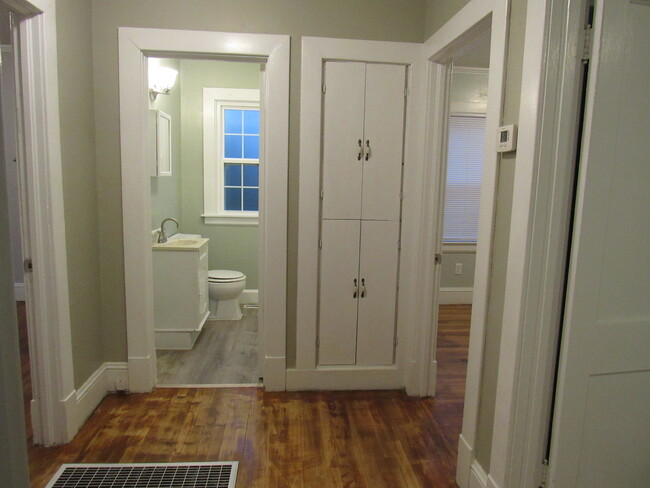 Hall to bedrooms and bathroom #2 - 1211 Charles Ave