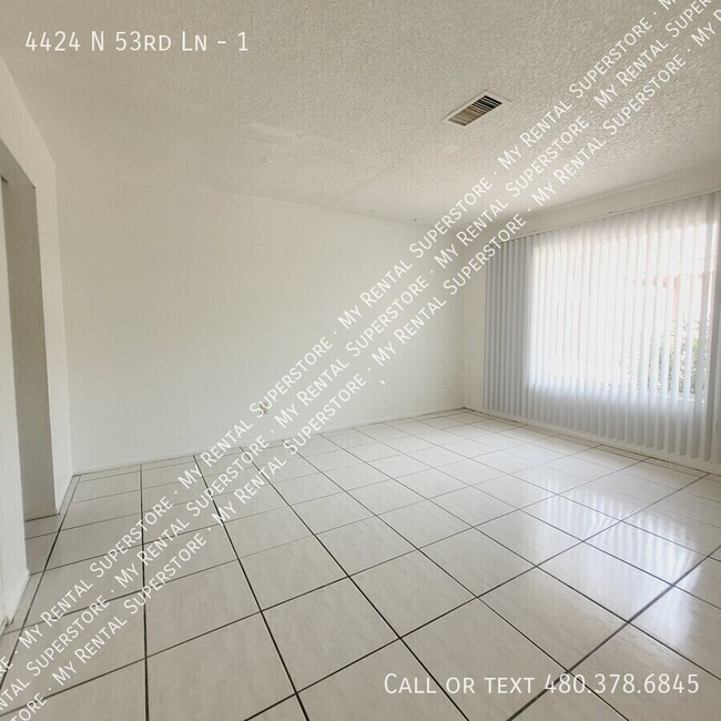 Building Photo - 4424 N 53rd Ln