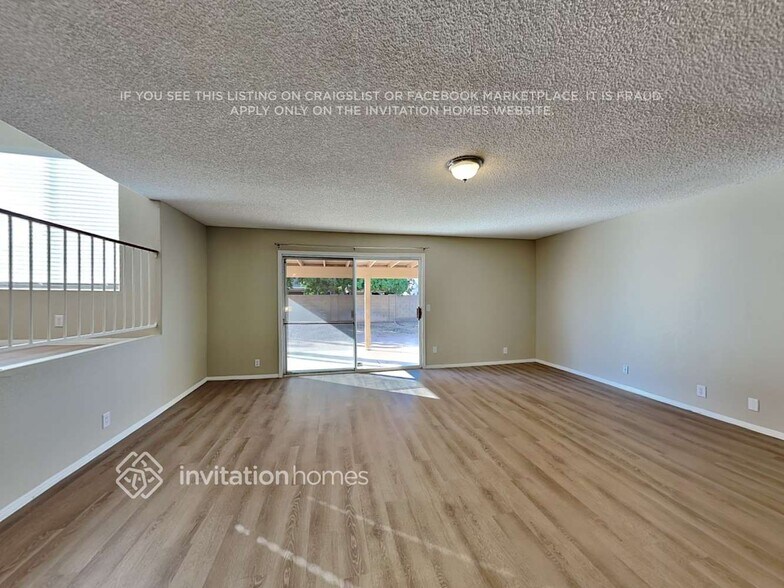 Building Photo - 8445 W Emile Zola Ave
