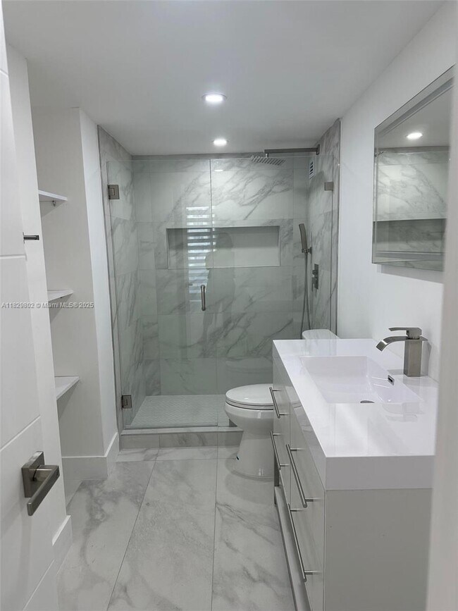 Building Photo - 5555 Collins Ave