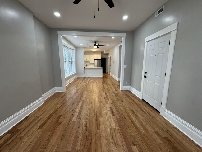 living room looking into dining room and kitchen - 4200 N Damen Ave