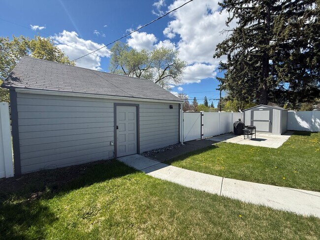 Building Photo - Ideally Located and Updated 4 Bed 2 Bath Fully-Fenced Home w/ Detached Garage/Shop!