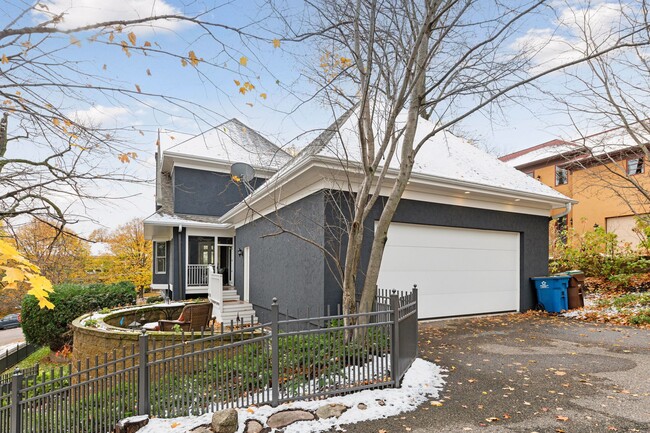 Spacious 2-stall garage, offering ample room for vehicles and extra storage - 745 Rice St E