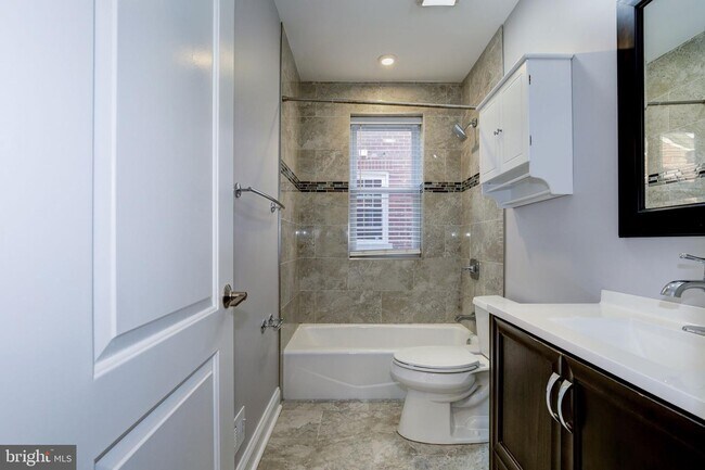 Building Photo - 4209 JENIFER St NW