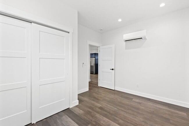 Building Photo - Brand new 2 bed/2 bath, central a/c, dishwasher, washer & dryer, deck & patio! March rent free!