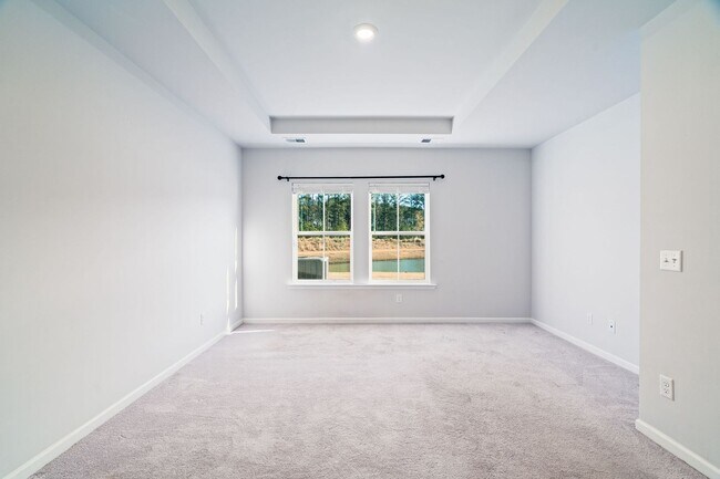 Building Photo - Peaceful Pondview Retreat!