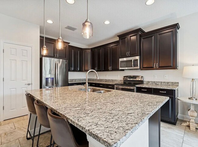 Building Photo - 3987 Sunset Lake Dr