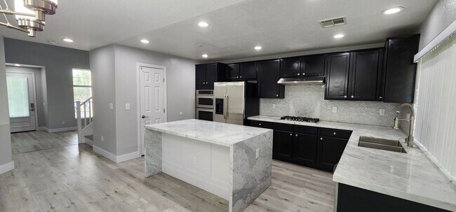 Building Photo - 4816 Magnolia Blossom Ave