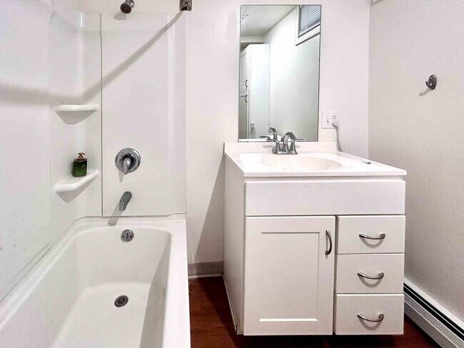 Building Photo - Spacious 3-Bedroom Apartment Near UVM with Private Entrance & Parking