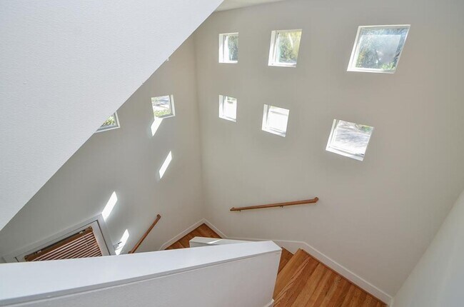 Building Photo - Stylish Corner Townhome Steps from Parks, Dining & Shopping