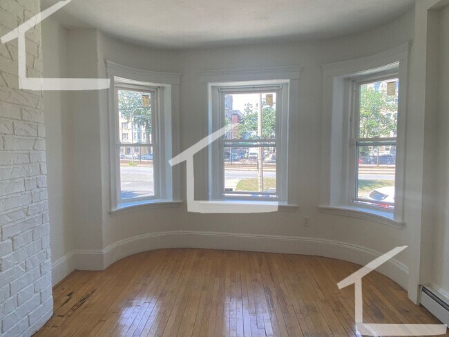 Building Photo - Ridiculous renovation in the living room including 'metal object'