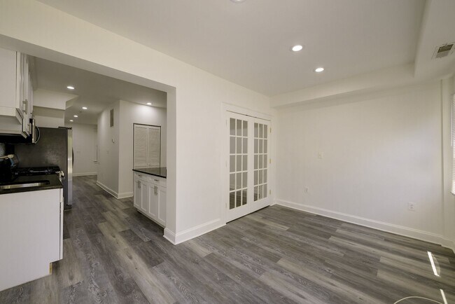 Building Photo - Charming & Renovated Petworth Rowhouse with Parking -  Available Now!