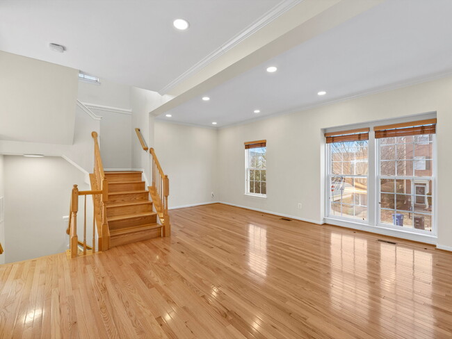 Building Photo - Sunlit Sanctuary Awaits: Spacious Townhous...