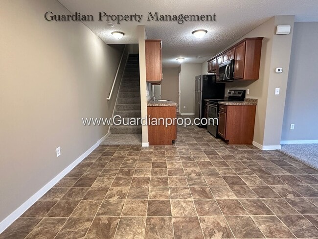 Building Photo - North Brooklyn Park Town Homes, Dedicated Office, 2 Car Garage, Washer/Dryer, Front Patio