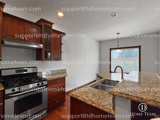 Building Photo - "Spacious 4-Bed Oasis in Kent with Elegant Granite & Hardwood Finishes!"