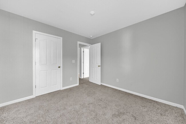 Building Photo - Two-story Condominium with Easy Highway Ac...