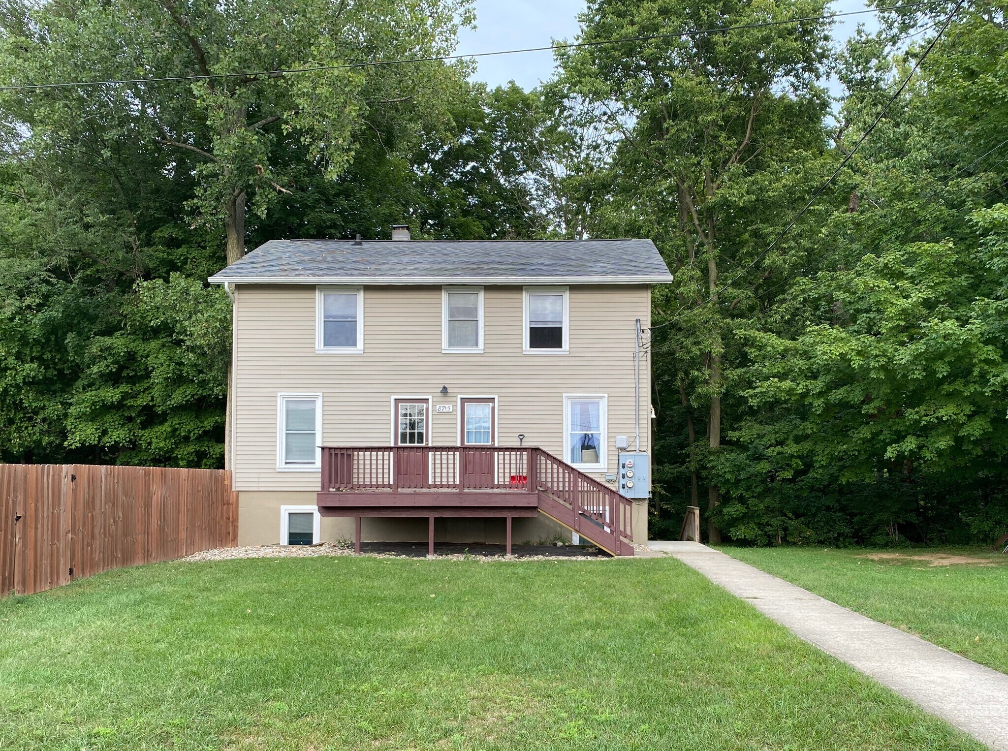 Apartment 3 is the top floor. - 8715 Valley View Dr.