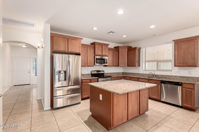 Building Photo - 9883 W Harmony Ln