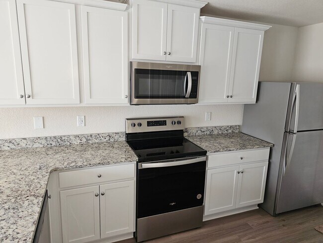 Building Photo - Brand New 3BR Home Minutes from the Airport