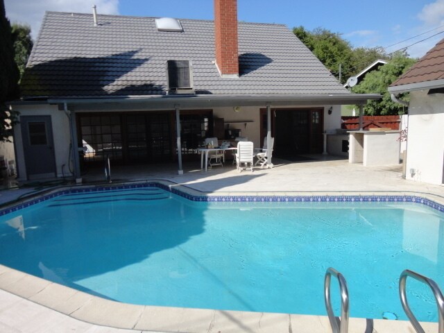 Building Photo - Throwback Charm Meets Spacious Living – Groovy Pool Home $1,000 Move in Special before May 31st 2026