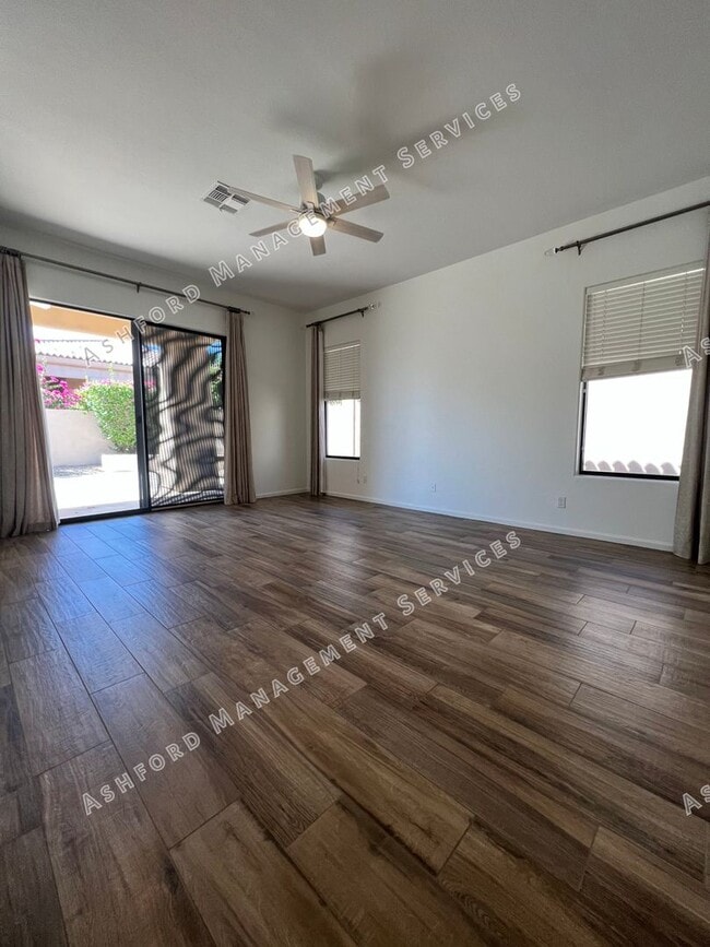Building Photo - COME HOME TO LUXURY IN GATED GRAYHAWK GOLF...